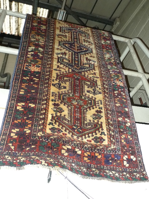 A fine North West Persian Heriz runner 350cm x 90cm repeating stylized geometrical pole medallion on