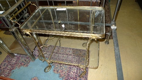 A brass and glass tea trolley