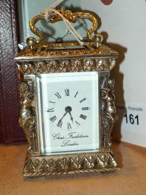 A hallmarked silver cased carriage clock with enamel Roman numeral dial