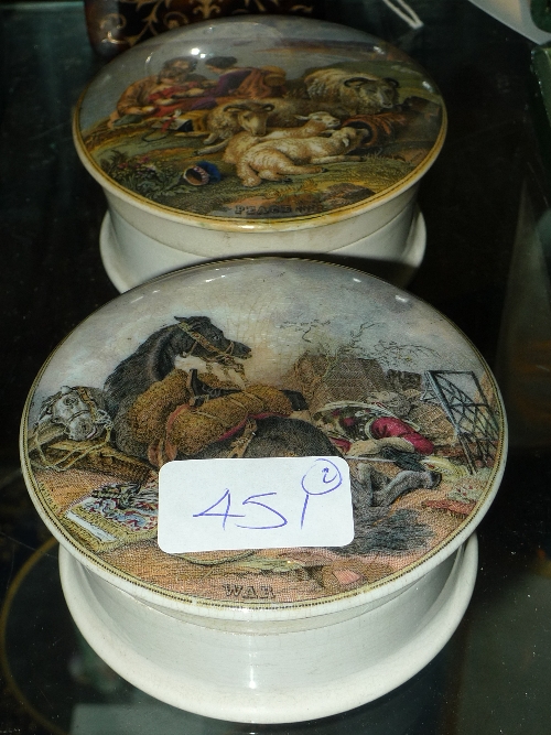 A pair of prattware pot lids and bases `War and Peace`