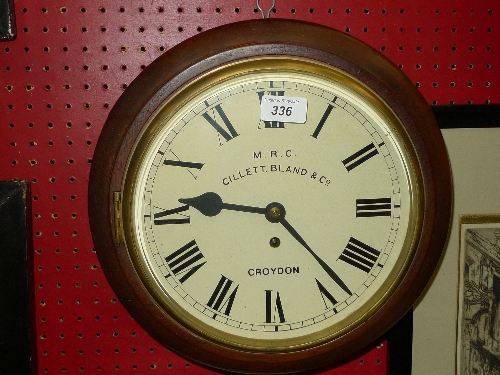 A mahogany cased wall clock with Roman numeral dial