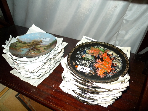 A set of German commemorative plates and a similar Russian