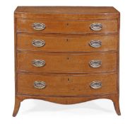 A George III mahogany and fiddleback mahogany bowfront chest of drawers, circa 1800, the shaped top