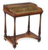 A William IV rosewood writing table, circa 1835, in the manner of Gillows of Lancaster, the raised