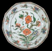 A Chinese famille verte saucer dish of deep, decagonal form, the well decorated in typical enamels