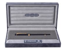 Parker, Duofold, Centennial, a black resin fountain pen, with a black barrel and cap, a gilt trim,