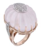 A diamond and rock crystal bombé dress ring, the frosted reeded bombé rock crystal centred with a