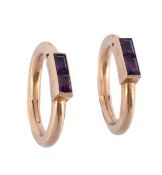 A pair of early 20th century amethyst cufflinks by Cartier, Paris, the oval cufflinks each set with
