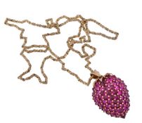 A synthetic ruby strawberry pendant on chain, the pavé set synthetic ruby pendant modelled as a