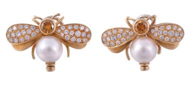 A pair of yellow diamond and diamond insect ear clips by Scortecci, each with brilliant cut yellow
