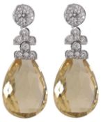 A pair of diamond and citrine ear pendents, the faceted citrine pear cut drops suspended by two