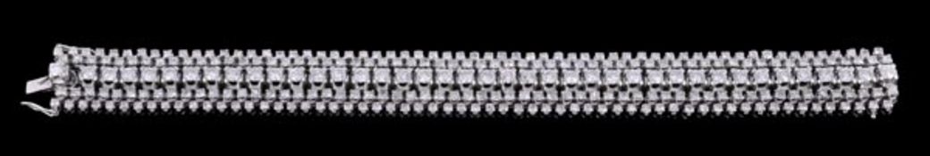 A diamond line bracelet, the four row bracelet set throughout with brilliant cut and eight cut