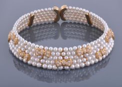 A cultured pearl and diamond collar, the five rows of graduated cultured pearls with nine applied