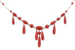 A coral drop necklace, the necklace set with round and oval cabochon red corals, (corallium