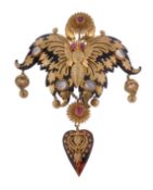 A late 19th century tortoiseshell butterfly brooch, circa 1890, the butterfly with cabochon ruby