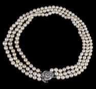 A three strand cultured pearl necklace, comprising fifty three, fifty seven and sixty one 6.8mm to