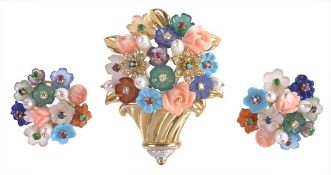 A multi gem set giardinetto brooch and ear clips suite, the swirling gold basket with a spray of