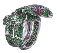 A tsarvorite garnet, sapphire, diamond and ruby snake dress ring, the snake shank pavé set all