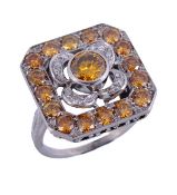 A yellow diamond and diamond panel ring, the central brilliant cut yellow diamond in a collet