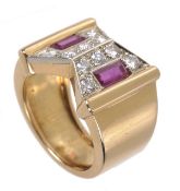 A ruby and diamond ring, the geometric style ring set with two rectangular cut rubies and brilliant