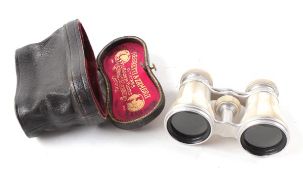 Negretti & Zambra, a pair of mother of pearl opera glasses, signed to the eyepieces, in the