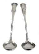 A pair of George IV Scottish single struck King`s pattern toddy ladles, maker`s mark `WM` over `AM,