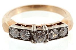 A five stone diamond ring, the old cut diamonds with a raised central stone, approximately 0.45