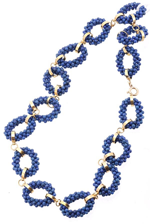 A lapis lazuli necklace, the woven small lapis bead links with circular link connectors, 47cm long