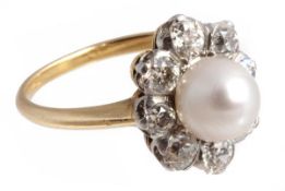 A diamond and bouton pearl cluster ring, the pearl within a surround of graduated old cut diamonds,