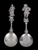 A pair of Dutch silver embossed spoons, import marks for B. Muller & Son, Chester 1898, with figure