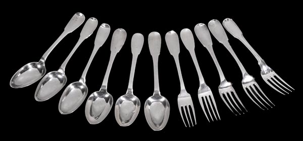 A collection of French silver fiddle pattern flatware, two table forks and five table spoons pre