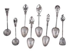 Five Australian Arts and Crafts hammered silver coloured coffee spoons by James Alexander Linton,