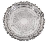 A late Victorian silver shaped circular salver by Charles Westwood & Sons, Birmingham 1900, with a