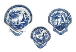 Three Caughley blue and white printed scallop-shell pickle dishes in sizes, decorated with the `