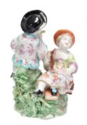 A Derby model of boy and girl musicians, modelled after a Sevres original by Pierre Stephen, 16.5cm