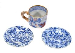 A Mason`s Ironstone miniature mug, printed in blue and painted in iron-red with oriental shrubs,