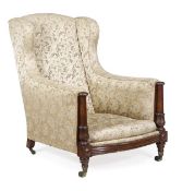 A matched pair of William IV armchairs, circa 1835, one rosewood framed, the other mahogany, of