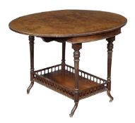 A Victorian walnut and burr walnut oval drop leaf table, circa 1870, gilt mounts throughout, the