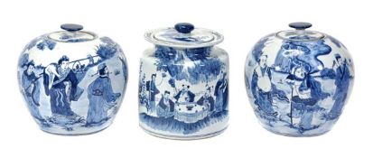 A pair of Chinese blue and white lidded jars, 20th century, of globular form decorated with the