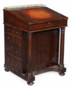 An early Victorian rosewood Davenport, circa 1840, gilt tooled leather inset hinged section,