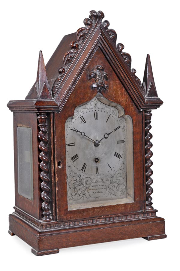 A William IV Gothic revival small carved oak library timepiece, Frodsham, London, circa 1830, the