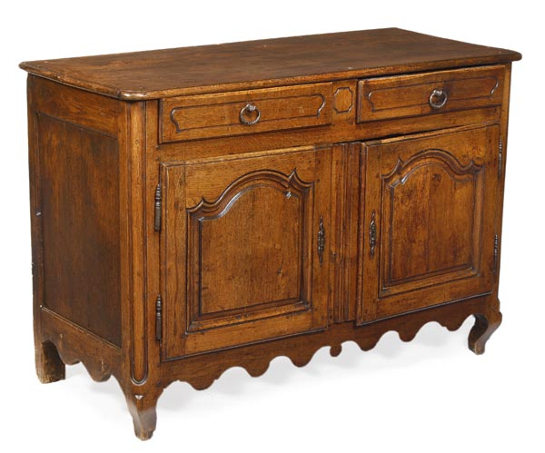 A Louis XV oak cupboard, circa 1750, moulded rectangular top above pair of drawers, a pair of arch-