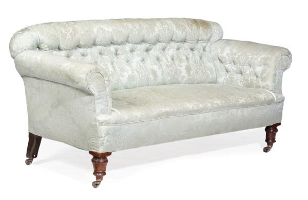 A Victorian walnut and upholstered Chesterfield settee, circa 1880, upholstered back, arms and
