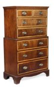 A mahogany and satinwood cross banded chest on chest, 18th century and later elements, dentil