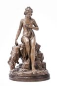 A Continental painted terracotta group of a Bacchante with a goat, possibly by Jean-Baptiste
