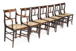 A set of seven Regency simulated rosewood children’s dining chairs, circa 1820, comprising an elbow