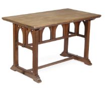 A Gothic Revival oak centre table, circa 1870, moulded rectangular top, rectangular trestle ends