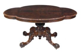 A Victorian burr and figured walnut centre table, circa 1870, scalloped oval top with gadrooned