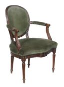 A Louis XVI carved beech and upholstered armchair, circa 1780, moulded oval back, shaped padded