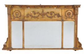 A giltwood and composition wall mirror in Regency style, late 19th/ early 20th century, the moulded